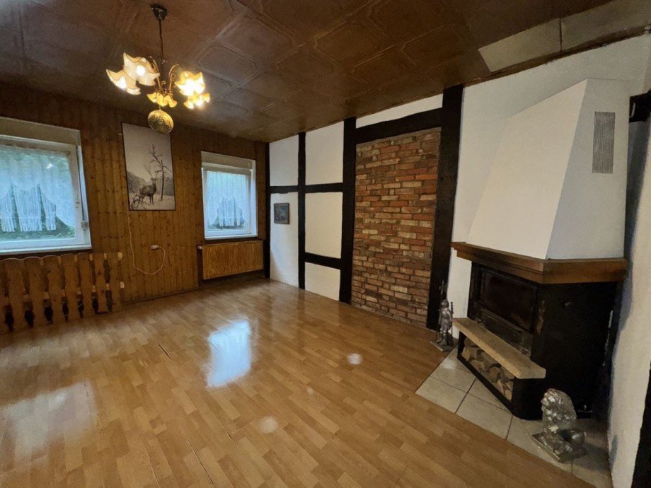 Wohnzimmer mit Kamin Doppelhaush�lfte Werle