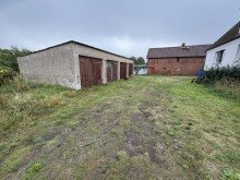 Garagen Zweifamilienhaus mit einer Mieteinheit auf einem gro�z�gigen Grundst�ck in Eldena