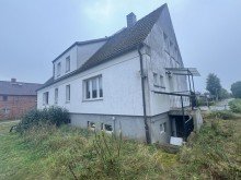 Hausansicht Zweifamilienhaus mit einer Mieteinheit auf einem gro�z�gigen Grundst�ck in Eldena