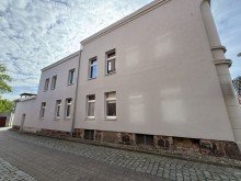 Hausansicht Seitenstra�e Mehrfamilienhaus mit 4 WE in Grabow