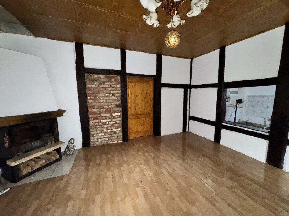 Wohnzimmer mit Kamin Doppelhaush�lfte Werle